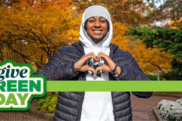 Engineering student, Joshua Buggs, making a heart with their hands