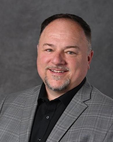 Professional Headshot of Andrew Mason