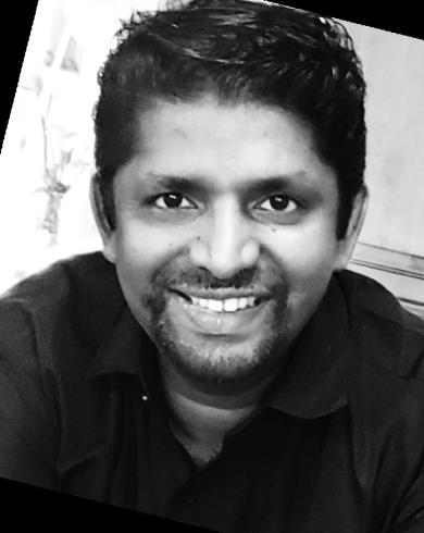 Professional headshot ofSanthosh Abraham