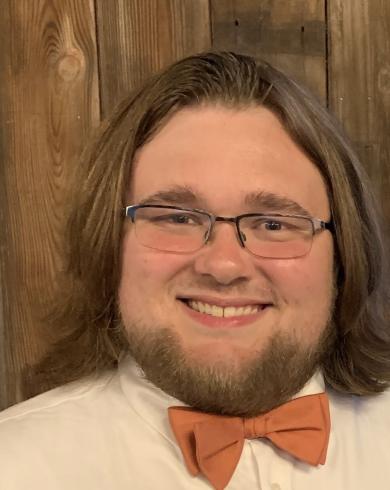 Professional headshot of Tyler Lovell