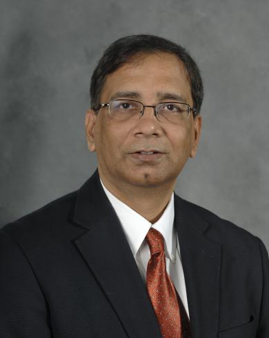 Professional headshot of Syed Hashsham