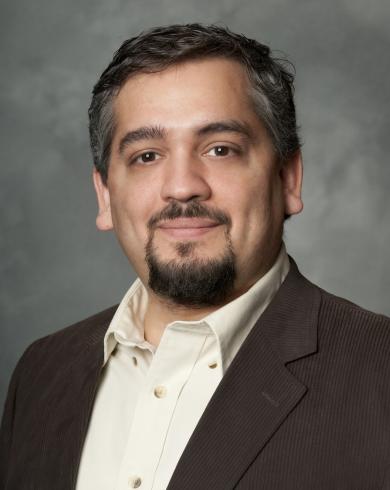 Professional Headshot of Charles Ofria