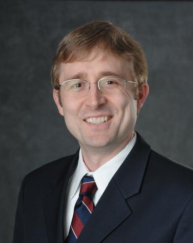 Professional Headshot of Christopher Saffron