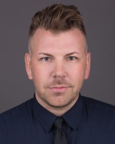 Professional Headshot of Alex Delavan