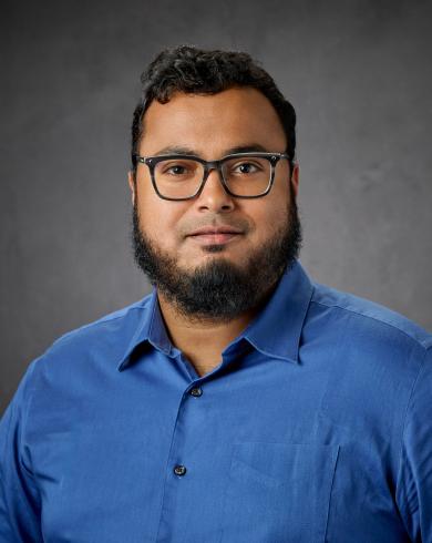 Professional headshot of Hasan Banna