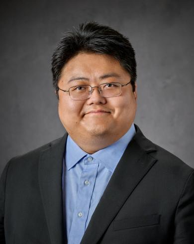 Professional headshot of Peizhi Wang